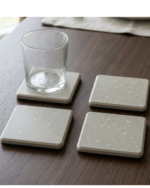 Knaik Square Mineral Composite Coasters 10 cm Grey Four Pack - Lifestyle view